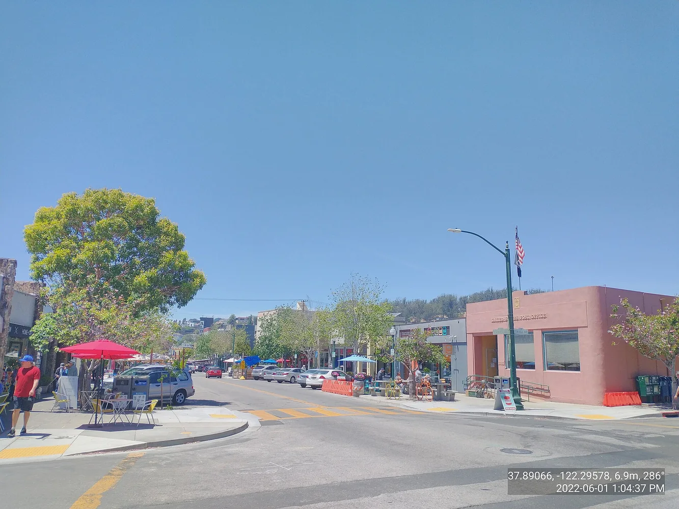 Shops, outdoor seating, and street life on Solano Avenue in Albany